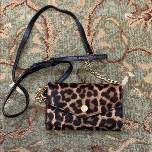 Michael Kors crossbody purse/ wallet.